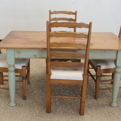 1294	PINE DINING TABLE W/4 LADDER BACK CHAIRS, CHAIR SEATS ARE STAINED, TABLE IS 60 IN X 36 IN X 30 IN HIGH, TABLE HAS A DAMAGE SPOT ON...