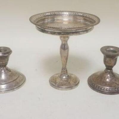 1215	STERLING LOT INCLUDING FOUR WEIGHTED CANDLESTICKS & COMPOTE APP. 6 IN H 

