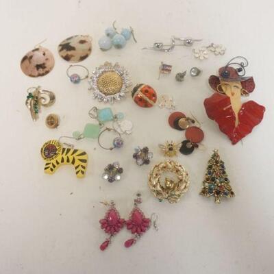 1175	11 PAIRS OF EARRINGS & 12 COSTUME PINS INCLUDING MONET AND BEST
