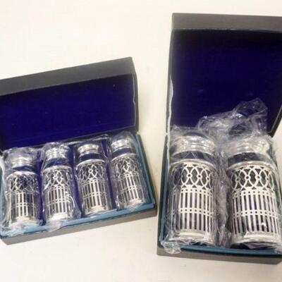 1186	WILLIAM ADAMS COLBALT SHAKERS IN ORIGINAL BOX, TWO ARE 3 1/2 IN & FOUR ARE 2 3/4 IN 
