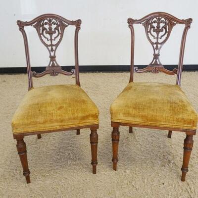 1038	PAIR OF VICTORIAN WALNUT CHAIRS W/PIERCED CARVED BACKS & UPHOLSTERED SEATS, WEAR TO UPHOLSTERY
