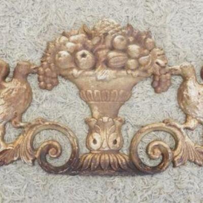 1279	CAST IRON ARCHITECTURAL PIECE W/ URN IN CENTER W/ FRUIT FLANKED BY BIRDS. APP. 29 1/2 IN X 11 1/2 IN 
