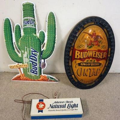 1169	3 PIECE BEER ADVERTISING LOT; BUD DRY, BUDWISER AND NATURAL LIGHT; BAR LIGHTS

