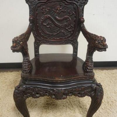1292	HIGHLY CARVED ASIAN ARMCHAIR, DRAGON CARVED ON BACK 

