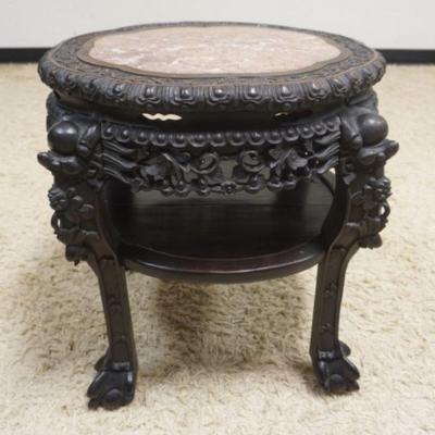 1291	ASIAN HIGHLY CARVED TABLE W/ INSET BROWN MARBLE TOP. APP. 22 IN X 23 IN H 
