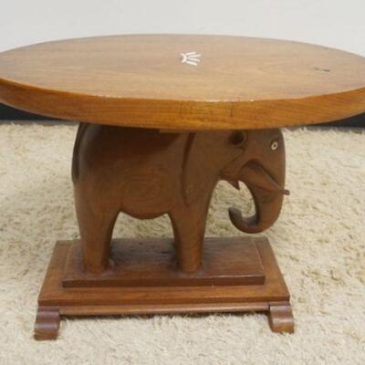 1290	MAHOGANY ELEPHANT LAMP TABLE SIMILAR TO THE ELENOR ROOSEVELT TABLE. APP. 30 IN X 24 IN 
