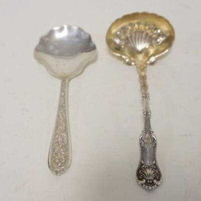 1017	STERLING LADLE & SHELL FORMED SPOON, SPOON IS APPROXIMATELY 5 1/2 IN & IS MARKED STIEFF, COMBINED WEIGHT IS 2.2 TOZ

