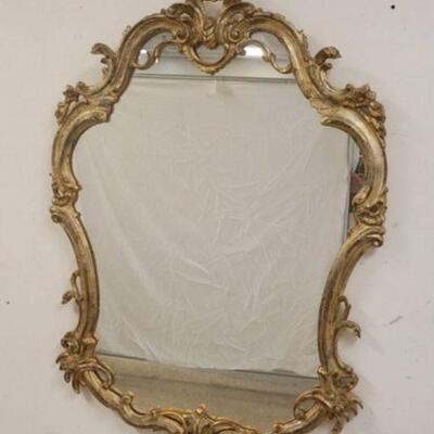 1323	ORNATE GILT MIRROR, APPROXIMATELY 29 IN X 44 IN
