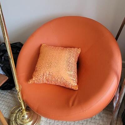 Cool tangerine low round chair