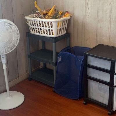 KKD002 Storage Cabinet, Floor Fan, Plastic Shelf, Hangers, And Laundry Bags