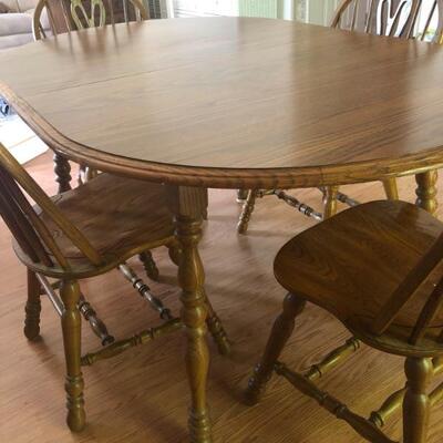 Dining room or kitchen dinette 6 chairs great condition, 10inch leaf in. 60 x 40 oval. 
$125 