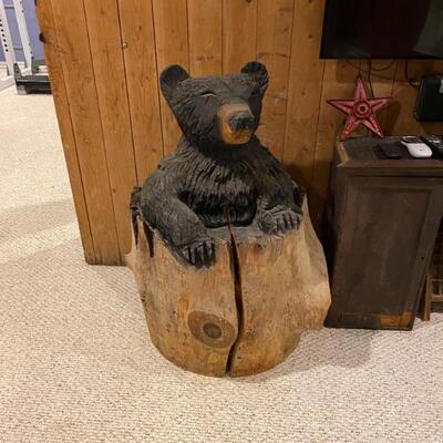 Carved bear out of one piece of wood by Chain Saw Signed