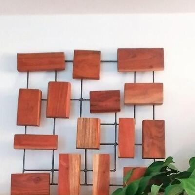 Matching piece of Teak Wall art (Marcel) from Crate and Barrel