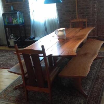  80â€x39â€30â€ Table and two benches are cherry. Chairs at head of table are red oak and walnut. 
