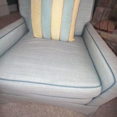 Light blue chair and striped cushion