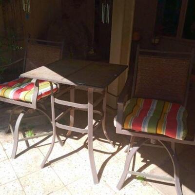 Patio furniture with striped cushions