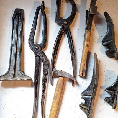 This is a nice set of cobblers tools... Even includes a bunyon stretcher!