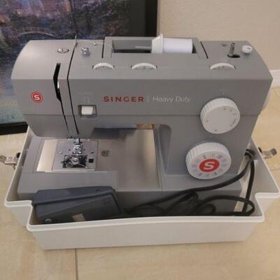 one year old Singer sewing machine