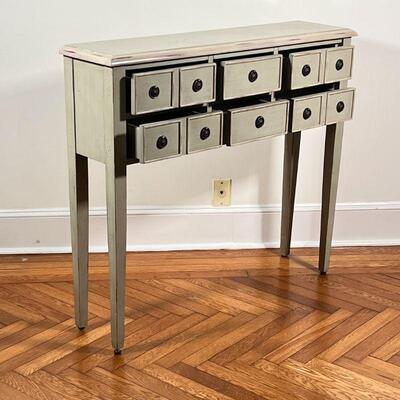 SHABBY CHIC CONSOLE TABLE | Having six drawers with round pulls on square tapering legs; h. 35-1/2 x w. 40-1/2 x d. 10 in.