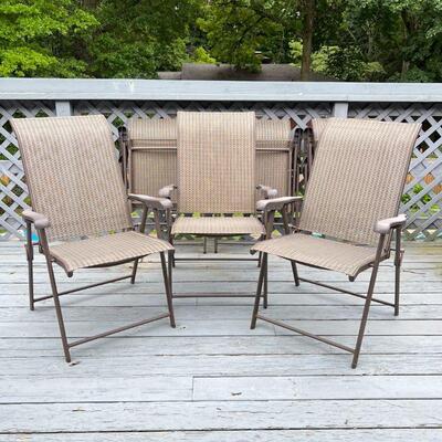 (6pc) PATIO CHAIRS |  A set of six outdoor folding arm chairs; h. 38-1/2 x w. 24 x d. 30 in. [can be cleaned, one or more arm rests with...