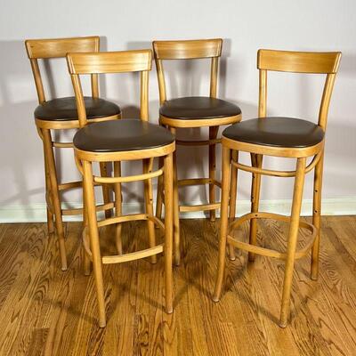 (4pc) THONET BAR STOOLS | Mid-century modern bentwood barstools made in the USA by Thonet Craftsmen, with padded seat cushions; overall...