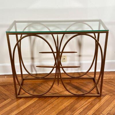 MODERN GLASS TOP CONSOLE TABLE | Contemporary hall table having a glass top on an openwork gilt metal frame; h. 34-1/2 x w. 42 x d. 16...