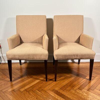 CRATE & BARREL SIDE CHAIRS | A pair of contemporary style armchairs by Crate & Barrel with beige fabric upholstery; h. 37-1/4 x w. 24 x...