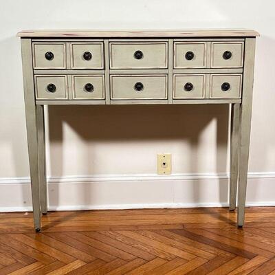 SHABBY CHIC CONSOLE TABLE | Having six drawers with round pulls on square tapering legs; h. 35-1/2 x w. 40-1/2 x d. 10 in.