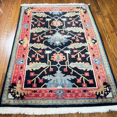 CONTEMPORARY CAUCASIAN RUG | Small area carpet with blue flowers within a red border; 6 ft. x 4 ft. 1 in.