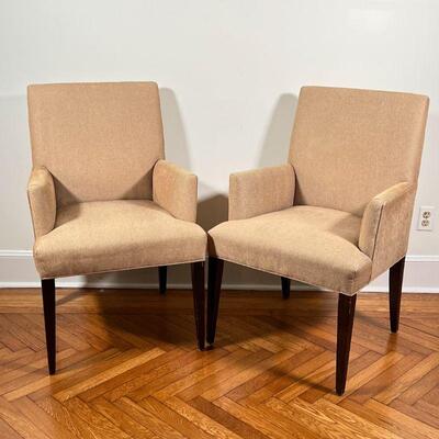 CRATE & BARREL SIDE CHAIRS | A pair of contemporary style armchairs by Crate & Barrel with beige fabric upholstery; h. 37-1/4 x w. 24 x...