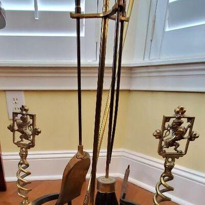Just added! Beautiful brass fireplace set with lion and barley twist andirons and a nice set of tools. $175