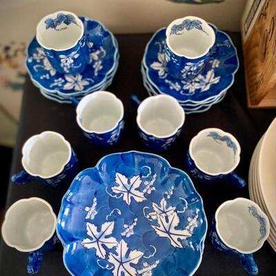 Hand-painted teacups, saucer, and hors dâ€™oeuvres plates