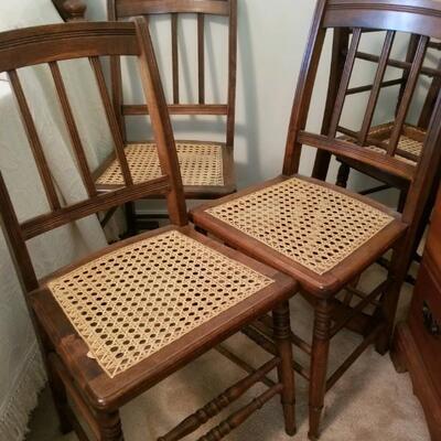 Antique chairs - set of 4/caned seats