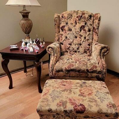 Wingback chair and matching footstool, side table and lamp