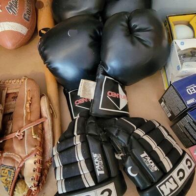 Boxing and hockey gloves