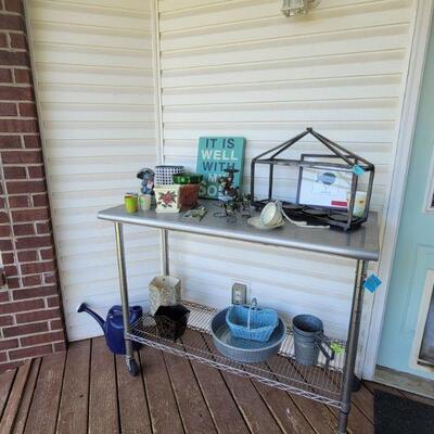 Table is not for sale, but all the outdoor decor is!