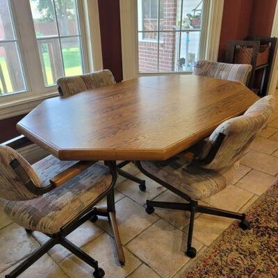 Kitchen table with 4 rolling chairs