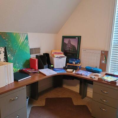 Corner desk with locking file cabinets.  Has adjustable keyboard holder.