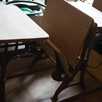Double antique cast iron school desk chairs and desk, 