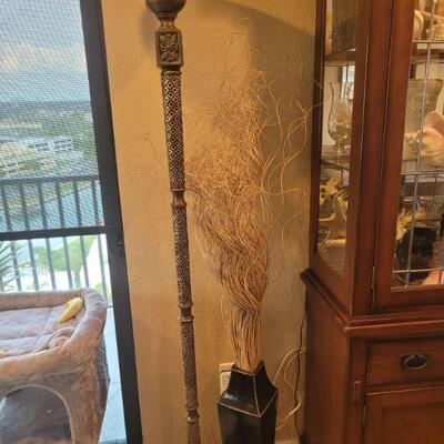 floor lamp and a large vase