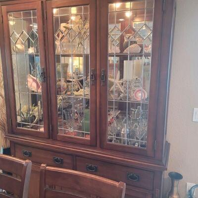 very nice china cabinet with glass shelves and lights, contents sold separately