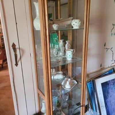 one of two curio cabinets