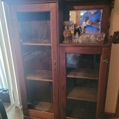 antique cabinet, glass door on left side is broken at the bottom