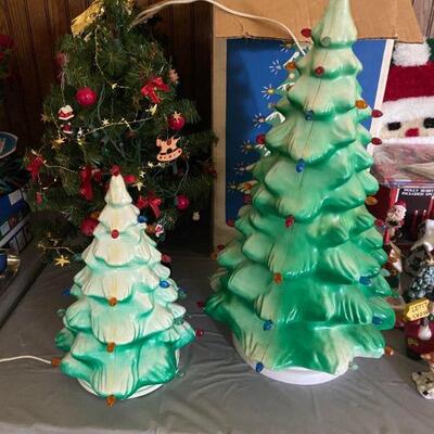 2- hard plastic electric Christmas trees- 12" and 21"