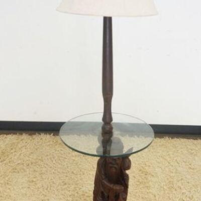 1164	WALNUT CARVED ASIAN FIGURAL FLOOR LAMP WITH GLASS SHELF CENTER, APPROXIMATELY 56 IN HIGH
