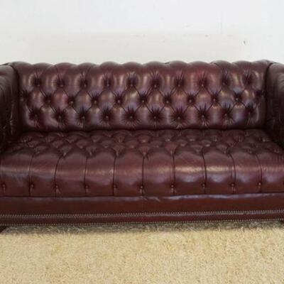 1191	BURGUNDY LEATHER CHESTERFIELD TUFTED SOFA, APPROXIMATELY 75 IN WIDE X 37 IN DEEP
