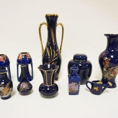 1025	LOT OF ASSORTED COLBALT DECORATED POTTERY & PORCELAIN, VASES & COVERED JAR, LARGEST IS APROXIMATELY 11 IN HIGH
