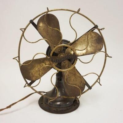 1037	ANTIQUE WESTINGHOUSE BRASS BLADE FAN, APPROXIMATELY 16 IN HIGH
