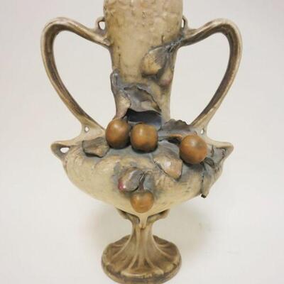 1030	AMPHORA DOUBLE HANDLED VASE W/FRUIT & LEAVES, ONE LEAF HAS REPAIR ON EDGE, APPROXIMATELY 14 IN HIGH
