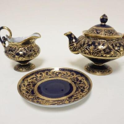 1017	HAND PAINTED NIPPON, TEAPOT, CREAMER & CUP UNDERPLATE, ALL HAVING GILT DECORATIONS, TEAPOT IS APPROXIMATELY 6 1/4 IN HIGH
